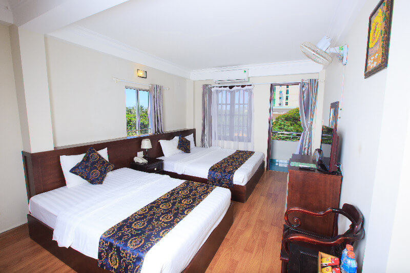 Phòng Deluxe Double with Two Double Beds - Khách sạn Phố Biển Nha Trang