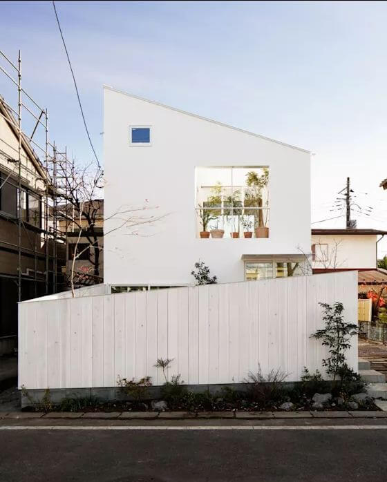 Nhà mái lệch với tone màu trắng tinh tế - Bản vẽ thiết kế nhà 2 tầng